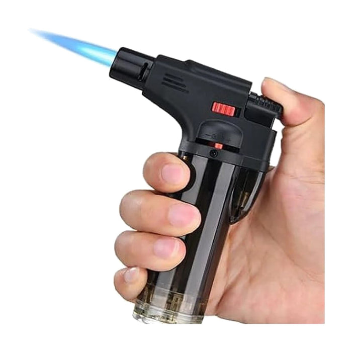 ZORACook Brass Blow Torch held in hand with an adjustable blue flame