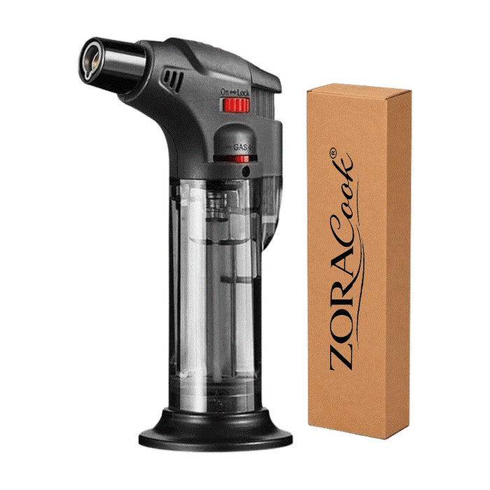 ZORACook Brass Blow Torch with copper nozzle beside its packaging